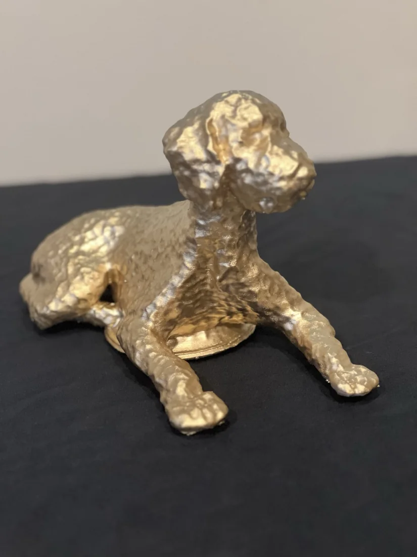 A finished goldendoodle commission from the studio, three-quarter view.